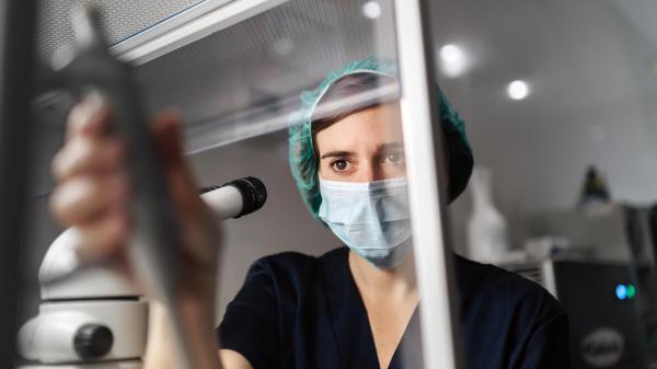 hospital care provider image of female lab technician